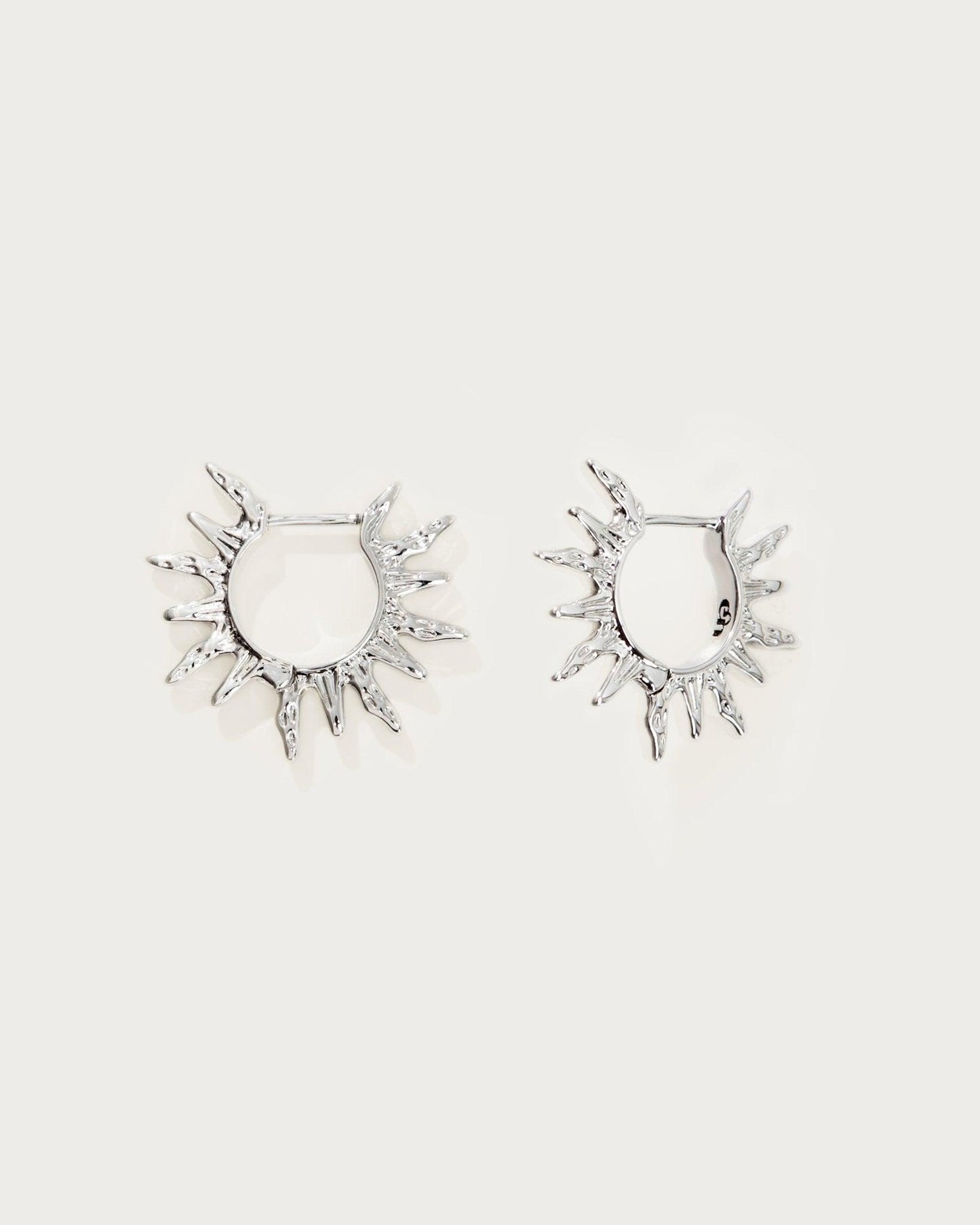 Boucles d'oreilles créoles soleil en argent